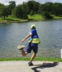 Lake LaPutka Throwing over Lake at Jones East Disc Golf Course