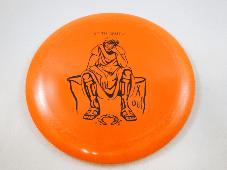 A disc golf disc with Infinite's X-out stamp