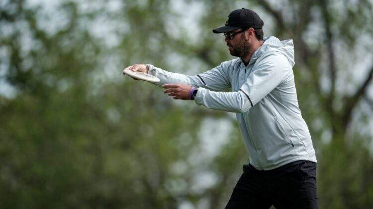 Professional Disc Golfer James Proctor preparing for a big putt