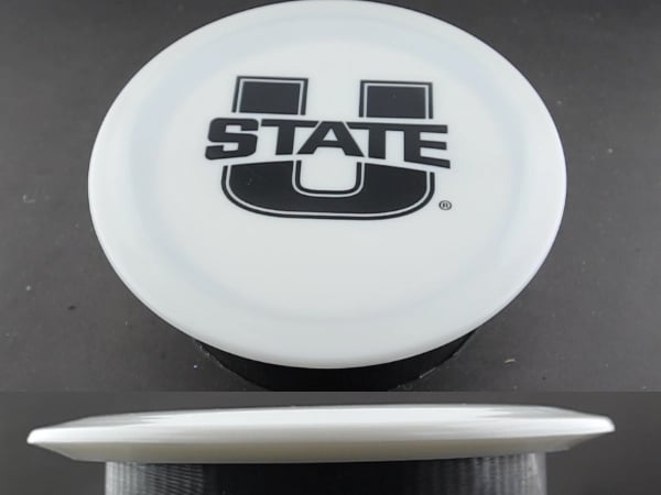 Utah State University logo on a disc golf disc