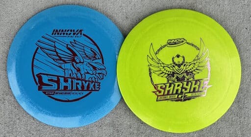 A GStar disc golf disc and a Star disc