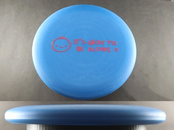 It's Okay to Be Alone stamp on a disc